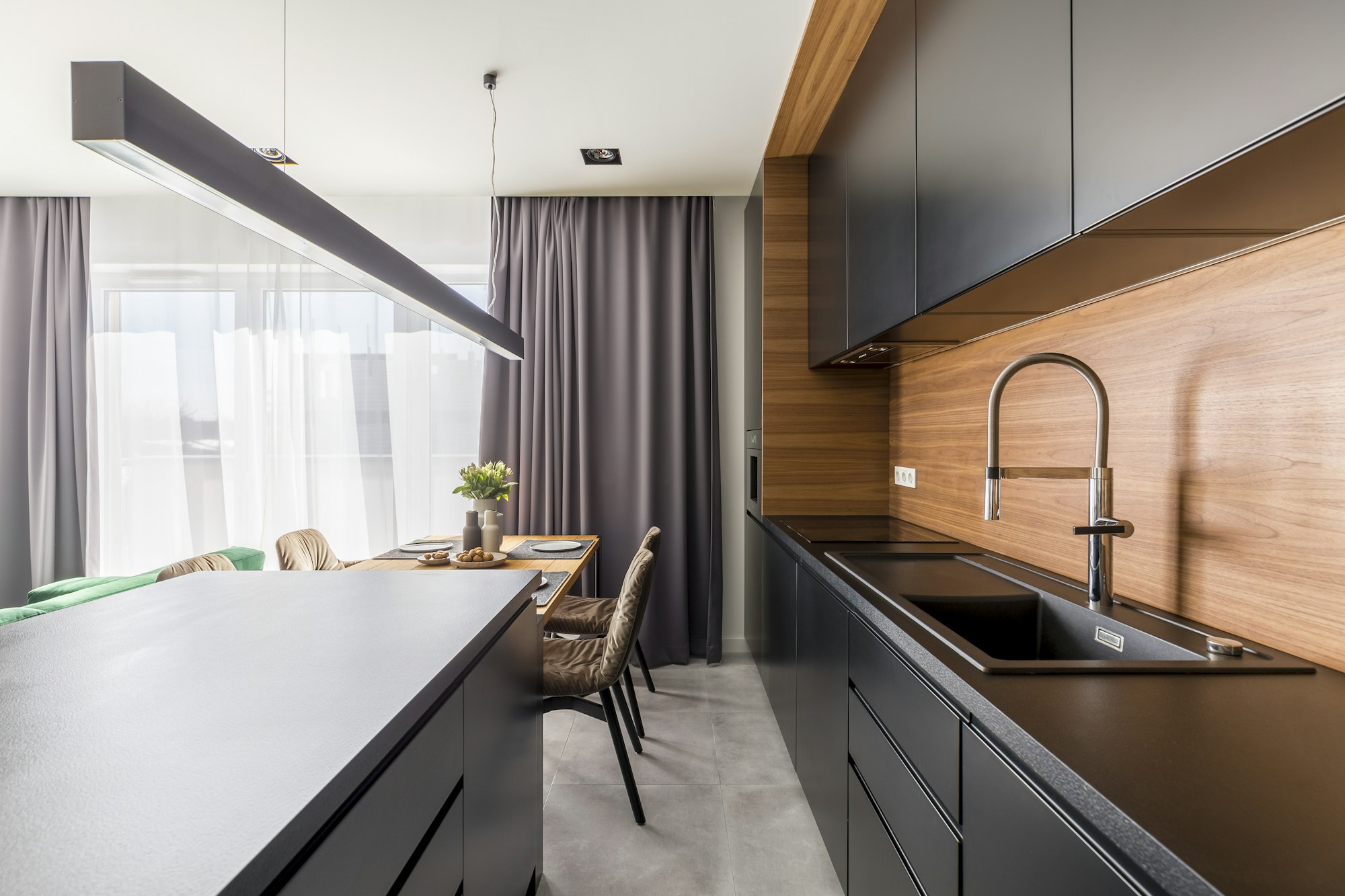 Kitchen interior with black cabinets